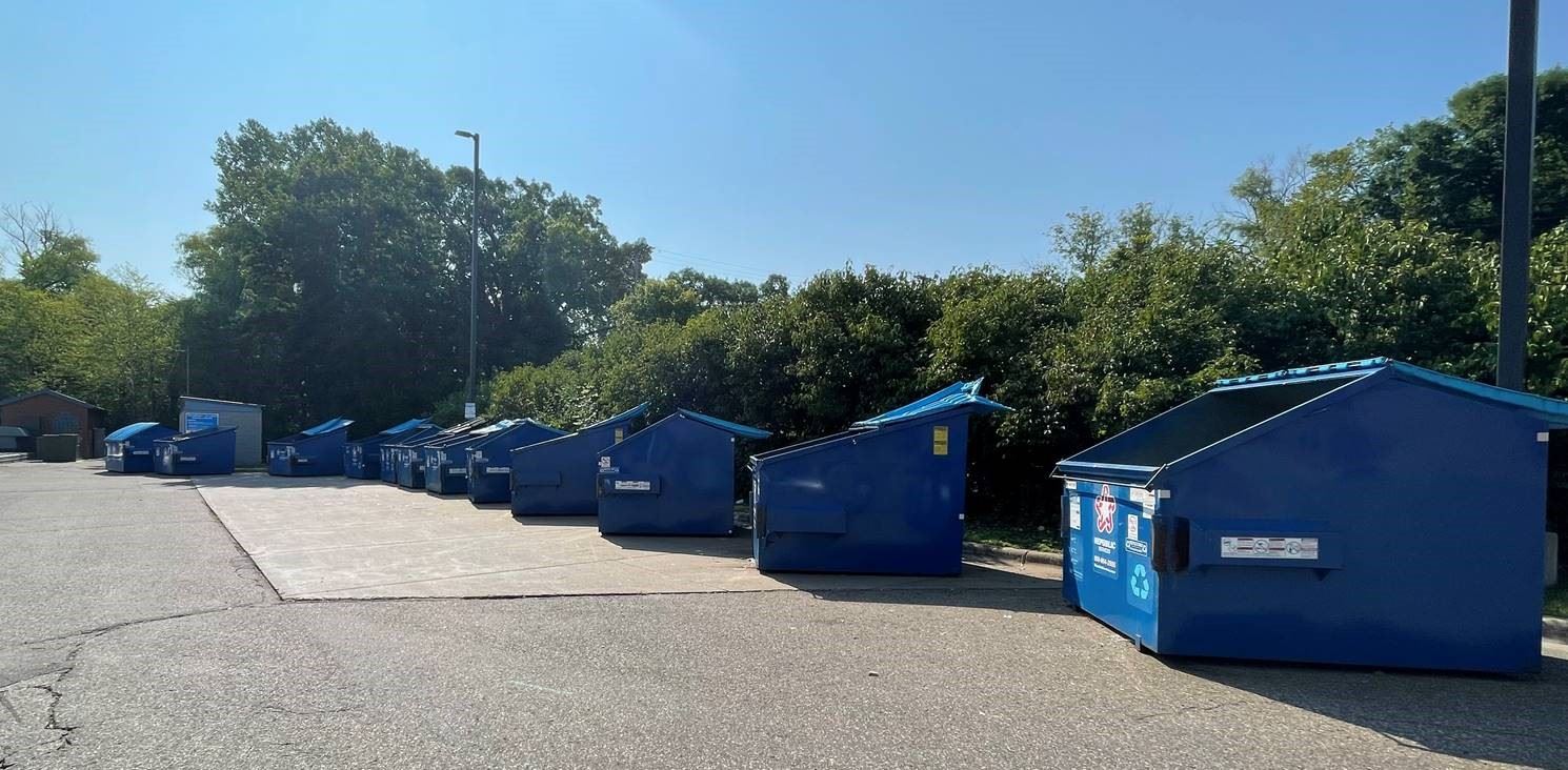 Recycling dumpsters at recycling drop-off center