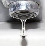 Water Dripping from Faucet